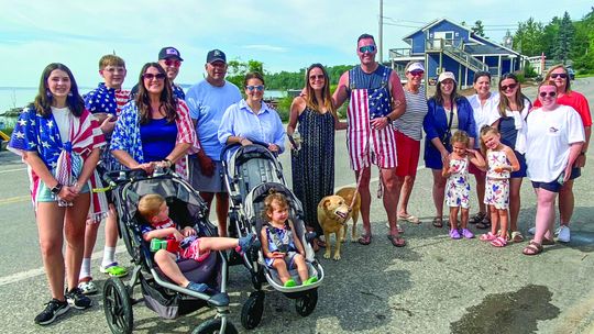 The Mahoney family 23 strong — adults and children — celebrated the 4th in Omena. Courtesy photo