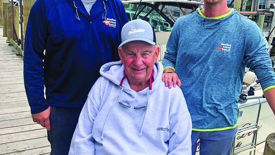 Jim Munoz, who has been charting clients out of Fishtown for 52 years, is flanked by his son, Jimmy, and grandson, Jack. Enterprise photo by Alan Campbell