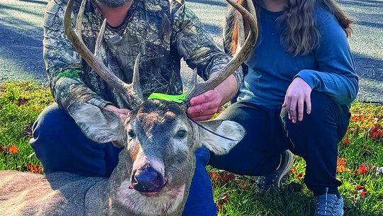 Jeremy Tobin, who shot two big bucks six days apart, occasionally hunts with his 14-year-old daughter Grace. His wife, Rebecca, helped track his first harvest, which had a tall rack. Courtesy photo