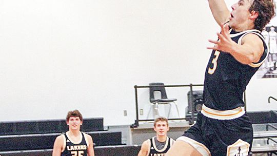 Glen Lake defeated Leland Tuesday night in a Northwest Conference game 74-20. Glen Lake junior guard Benji Allen attempts a dunk against Leland.
