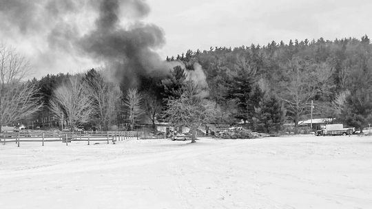 The maintenance barn at Camp Leelanau was destroyed by a fire Monday. Courtesy photo from Ken Fritz