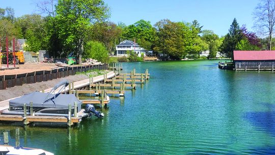 Two restaurants and Leland Township are updating or plan to update their shoreline components to the Leland River as it widens and turns toward Lake Michigan. Enterprise photo by Alan Campbell