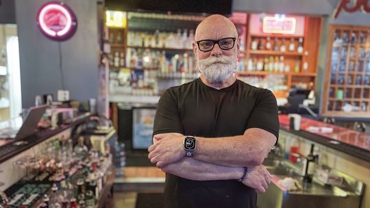 Scott North of Streetside Grille in Suttons Bay has been serving up drinks and smile for the past decade. Enterprise photo by Brian Freiberger