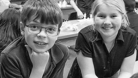 Luke Mullane and Mary Grant are all smiles as they gather for the first St. Mary School Chess Club meeting. Courtesy photo