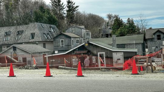 Work on the walkways in Fishtown is underway, prepping for the upcoming summer season. Enterprise photo by Amy Hubbell