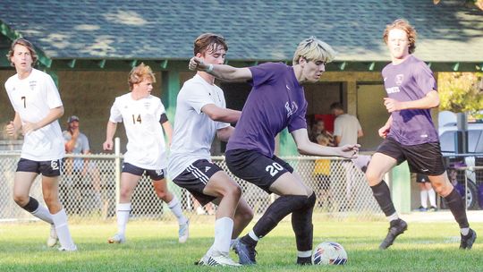 Leland senior attacker Landon Allen scored four times against Tawas to lead the Comets to a 8-0 win in the regional semifinal. This photo was taken earlier in the season during a nonconference game. Enterprise photo by Brian Freiberger