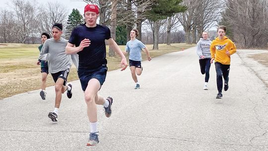 Leland senior Jimmy Alpi leads the team during a sprint workout last week. Courtesy photo