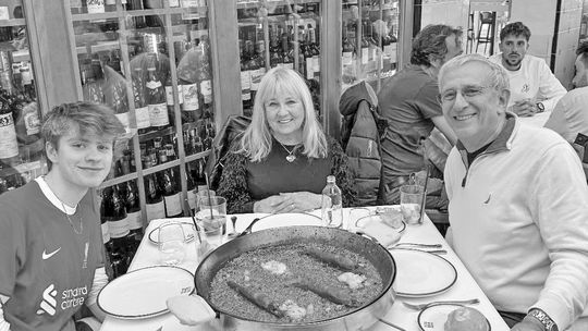 Roberta and Allan Cohen enjoyed some paella in Valencia, Spain, with their grandson, Killian Pozdol, who is studying there for a semester. Courtesy photo