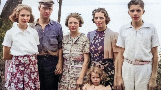 Some members from two generations of the DeKorne family stand together for a family photo at Inspiration Point on Glen Lake. Second from the left is Casey DeKorne, who worked alongside his brother Lewis to develop their father Boudewijn’s wood carving business into DeKorne Furniture Compan...