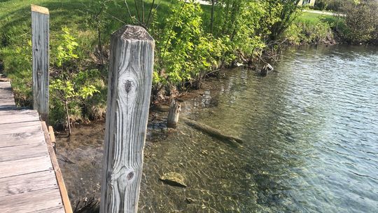 The 96-foot dock, which lined the Leland River at a stateowned boat launch, was located between the Bluebird and Riverside restaurants. It was moved by the state Water Resources Division of the Department of Environmental, Great Lakes, and Energy. Enterprise file photo