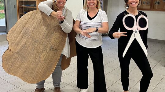 Dressed up as rock, paper, scissors were St. Mary’s Anne Grant, Principal Megan Glynn and Patti Shaffran. Courtesy photo