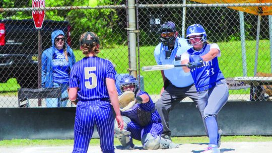 Lake Leelanau St. Mary senior Leah Fleis drill a 2-run home run over centerfield during a MHSAA Div. 4 regional softball game at Frankfort on Saturday. Enterprise photo by Brian Freiberger