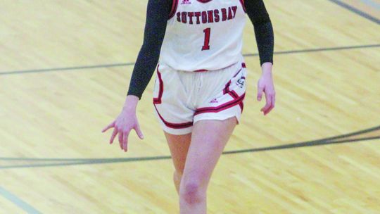 Hursh dribbles up the court against Lake Leelanau St. Mary last week.