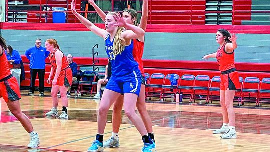 Lake Leelanau senior Leah Fleis posts up a Bedford defender during a downstate trip this weekend. Courtesy photo