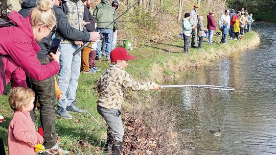 Families enjoyed the bit of sunshine Saturday morning after the rain during the annual Scott Brow Kid’s Fishing Day at the Mill Pond in Northport. More fish derby photos on Pg. 7. Enterprise photo by Meakalia Previch-Liu