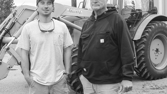 Father and son, Dan (right) and Alex (left), of Empire Trellis are continuing the dream located right from the family farm in Empire Township. Enterprise photo by Brian Freiberger