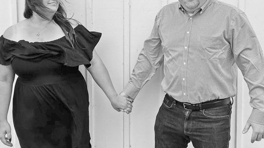 Leelanau residents’ Frank and Kayla Mancuso, pictured here in one of their engagement photos, first met each other working at Munson Medical Center. Photo courtesy of Kendra Kemp