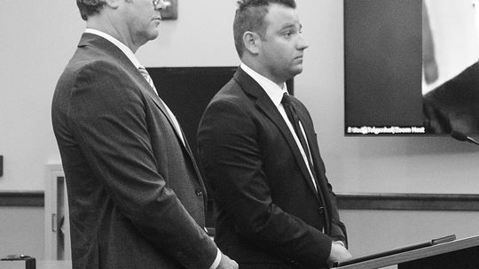 Elijah George (right) hears the sentencing handed to him on two charges including use of a computer to commit a crime (a 4-year felony) and surveying an unclothed person (a 0-11 month felony). Enterprise photo by Brian Freiberger
