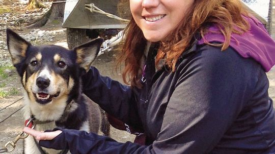 Bonnie Bastian and a buddy, an Alaskan sled dog. Courtesy photo