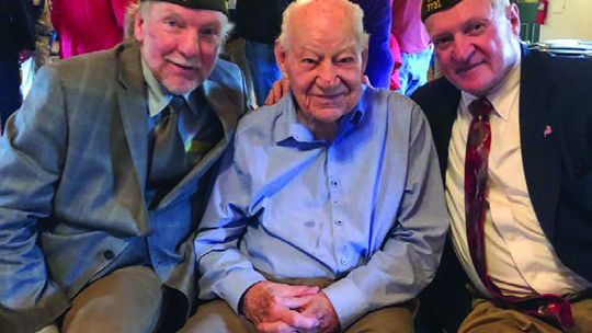Army vet Dick Grout, 103, is flanked by Jim Simon, left, and Gene Kelly, right at the county’s Memorial Day ceremony. Grout served during World War II and was part of D-Day operations in Normandy. Enterprise file photo