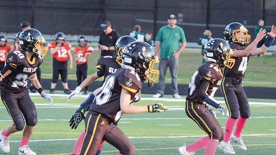 Glen Lake third and fourth graders play in a regular season finale against Harbor Springs Saturday.