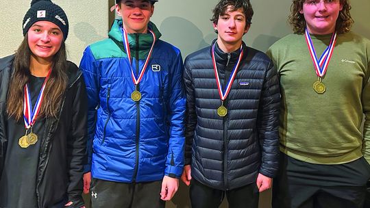 Glen Lake cooperative skiers, from left, Willa Murry (Leland), Justin Thompson (GL), Hawthorne Sutherland (GL), and Colin Kasben (GL) earned medals during the Bryan Groenevelt Memorial Invitational at Crystal Mountain on Monday. Courtesy photo