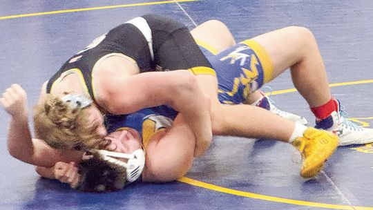 GL wrestling competes at Evart