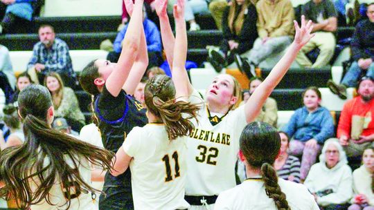 Glen Lake and Leland girls basketball teams compete