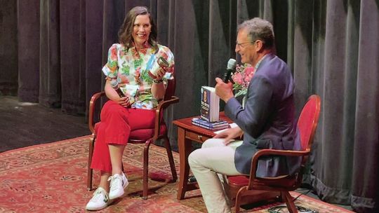 Governor Gretchen Whitmer was presented with her very own inspired product, “True Gretch Cherry Salsa,” from Cherry Republic Founder Bob Sutherland at the National Writers Series event on July 31. Enterprise photo by Meakalia Previch-Liu