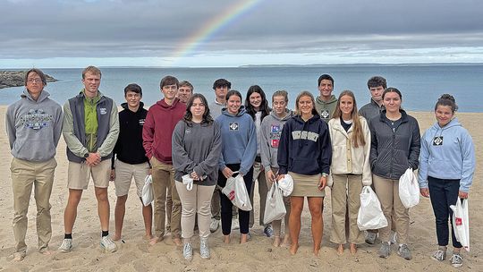 High school students from St. Mary School went on a field trip to Leland’s North Beach to create art from nature. Emulating artist Andy Goldworthy’s work created from sticks and stones, students collected items to place on driftwood. They were greeted by a rainbow as they combed the beach...