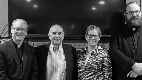 St. Mary School Benefactor of the Year Award went to Larry and Jackie Fleis. They are shown here flanked by Bishop Jeffery Walsh, left and the Rev. Ben Martin. Courtesy photo