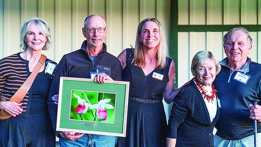 Kerry Kelly was named the winner of TART Trails 2024 Jim Mudgett Trail Pioneer Award. Pictured from left are his wife, Kathy Kelly; Kelly; Julie Clark from TART Trails; Carol Quarderer and Friends of Sleeping Bear board member George Quarderer. Courtesy photo