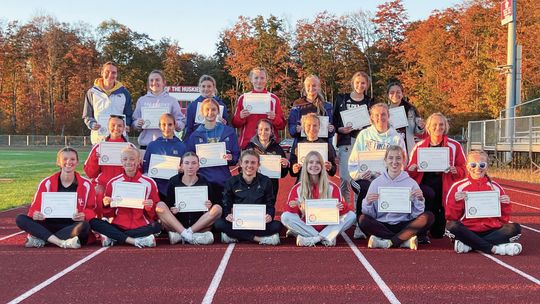Northwest Conference runner who received all-conference recognition were recognized Tuesday at a Northwest Conference cross country meet at Benzie. Leland senior Ella Knudsen and Glen Lake freshman Carmella Julian are sitting in middle of front row.Leland sophomore Natalie Burpee and Glen...
