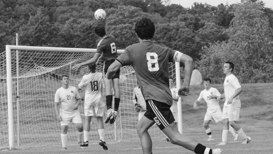 Glen Lake sophomore Ezra Belanger rises for a header shot against Reed City on Monday. Enterprise photo by Brian Freiberger