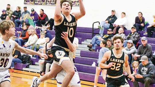 Glen Lake junior Keaton LaCross drives the lane against Frankfort Friday. The Lakers beat the Panthers for the second time this season 57-30. Photo Courtesy of Jill Plamondon