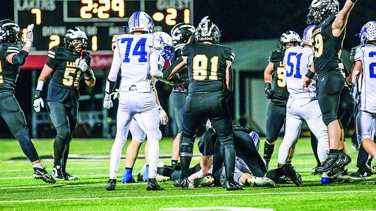 The Glen Lake defense celebrate after forcing a turnnover against Beal City Friday. Photos courtesy of Meredith McNabb