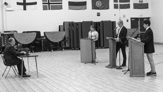 Glen Lake seniors Kyra Lamb (left), Sully Seymour (middle) and Noah Scott (right) participate in a mock election Monday. Enterprise photo by Brian Freiberger