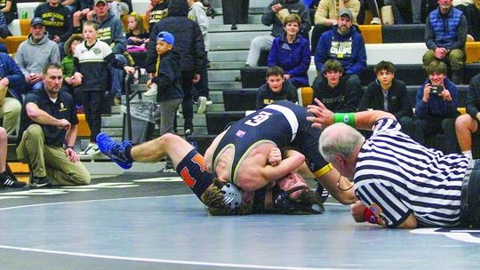 Glen Lake junior Boden Fisher wins the first individual Laker home wrestling match since the early 2000s last Wednesday, January 25. Enterprise photo by Brian Freiberger