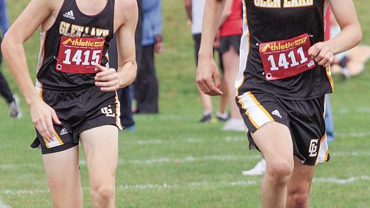 Glen Lake sophomore Britton Wheeler and junior Dexter Martin compete during a home meet Tuesday. Enterprise photo by Brian Freiberger