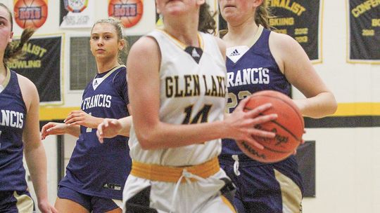 Glen Lake junior Jessie Pugh scores a bucket late in the fourth quarter against St. Francis in a 36-32 win. Enterprise photo by Brian Freiberger
