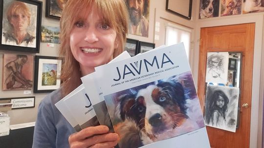 Kat Dakota’s artwork, pictured here, is featured on the August issue of the Journal of American Veterinary Medical Association. Courtesy photo