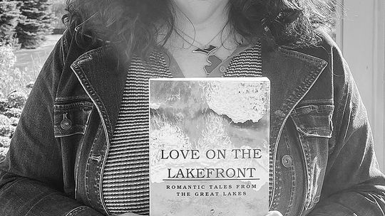 Lisa Rabey, a local author based out of Cedar, is one of the featured authors in the recently published anthology “Love on the Lakefront: Romantic Tales from the Great Lakes.” Enterprise photo by Meakalia Previch-Liu