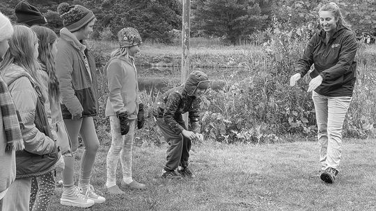Ellie Johnson, conservation district forester, is pictured presenting educational programs to Leland fifth graders in October during the organization’s annual field day at Veronica Valley Park. Enterprise photo by Meakalia Previch-Liu