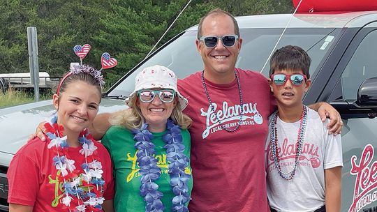 From left to right: Elise, Taylor, Kevin and Emdyn Vann help celebrate the Fourth of July with their Leelanau Tea truck. Courtesy photo