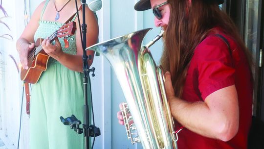 LaRose Music jammed out at an intimate venue at Yard and Lake in Northport during Leelanau UnCaged 2024. Pictured: Kevin LaRose (right) and Sierra LaRose (left).