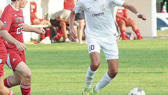 Leland sophomore Nano Creamer battle for possession during an 8-0 win over Suttons Bay last week. Enterprise photo by Brian Freiberger