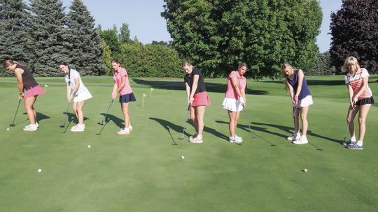 Leland girls golf swings into season