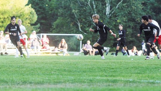 Leland senior Max Waldrup leads the Comet attack in a 7-0 win over Benzie Monday. Enterprise photo by Brian Freiberger