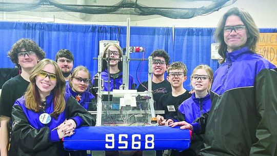 Leland & SB compete in a robotics tournament