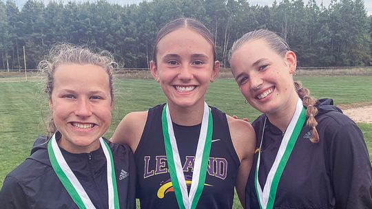 Leland thinclads take home eight medals; Lakers dominate at home meet
